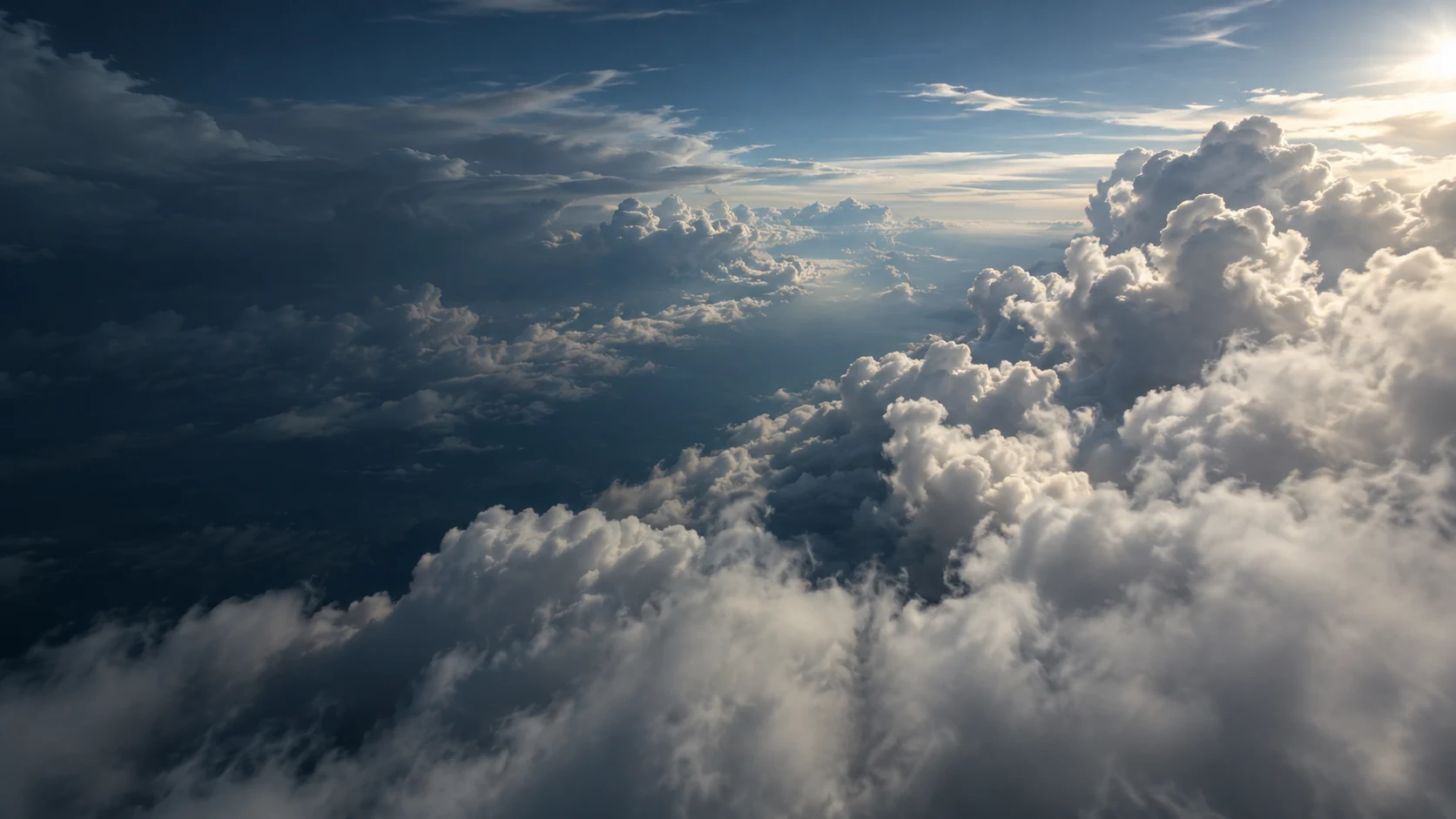 Silver clouds across a blue-grey sky